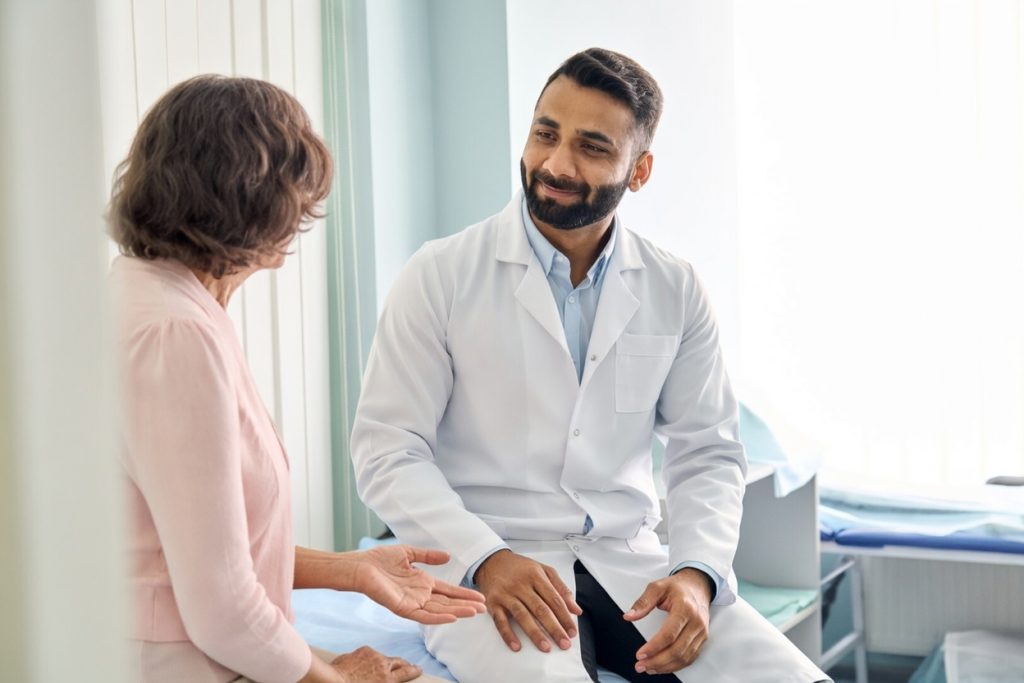 Physician speaking with a patient during a consultation at LVVIS